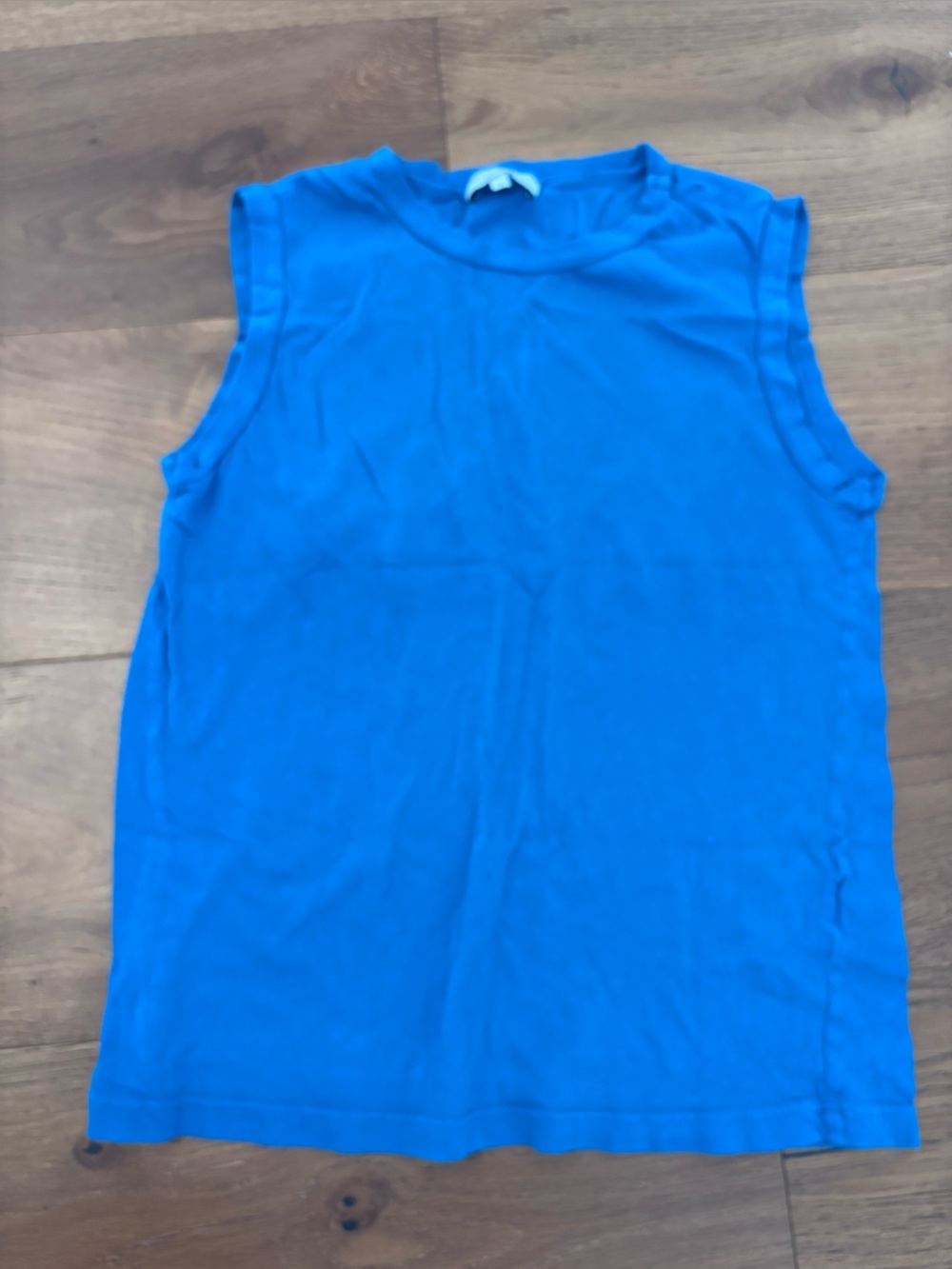 Kids blue top neckline with tag